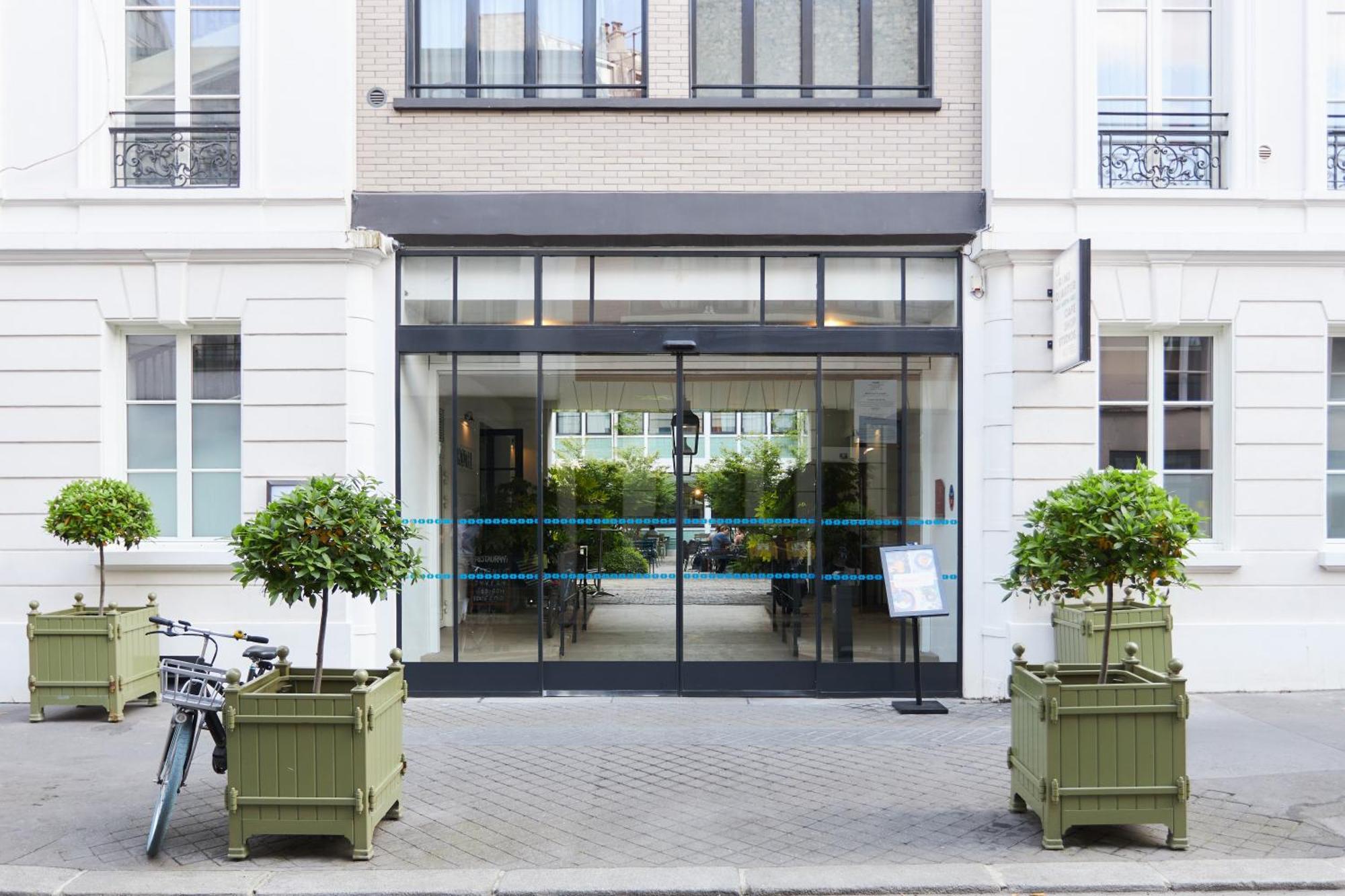Hotel Le Grand Quartier Paris Exterior foto